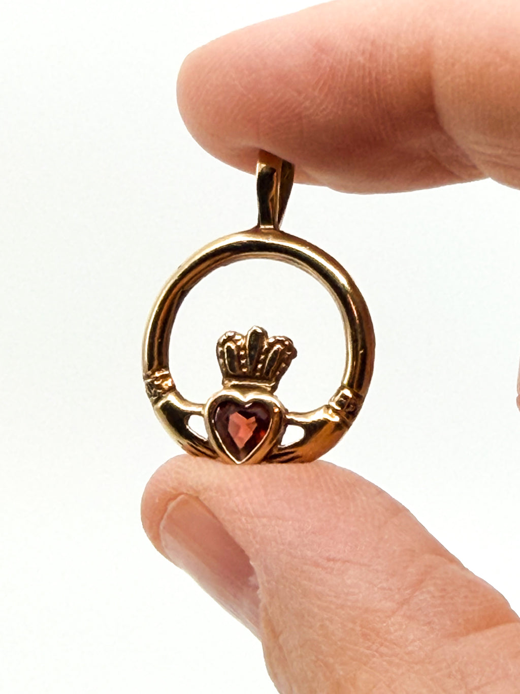 Vintage 9k gold claddagh pendant with garnet stone
