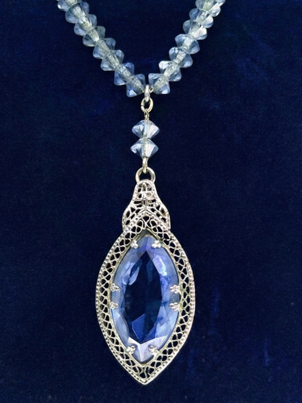 Art Deco blue glass pendant necklace strung on chain