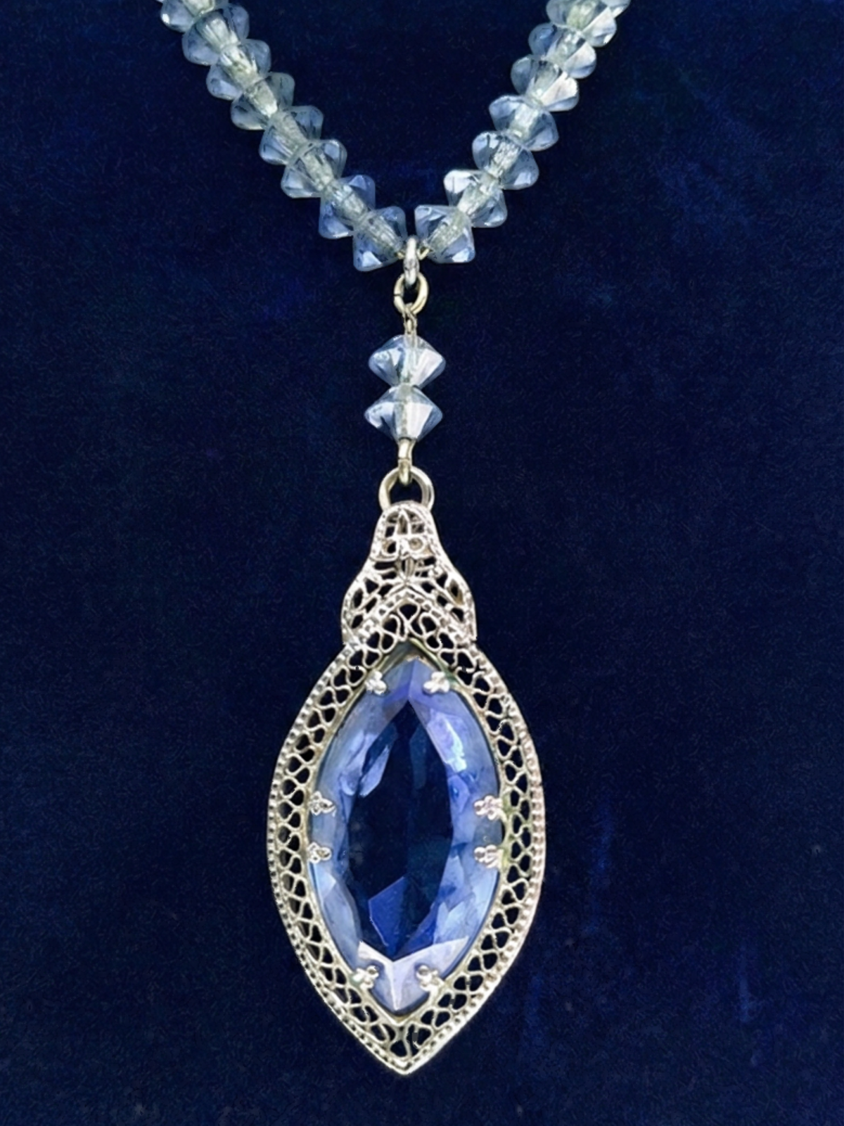 Art Deco blue glass pendant necklace strung on chain