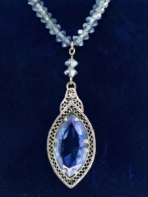 Art Deco blue glass pendant necklace strung on chain