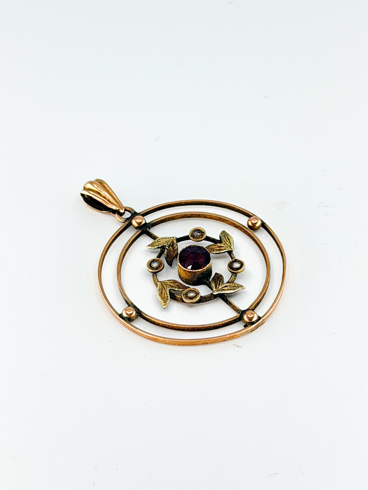 Edwardian 9k gold lavalier pendant with garnet and seed pearls