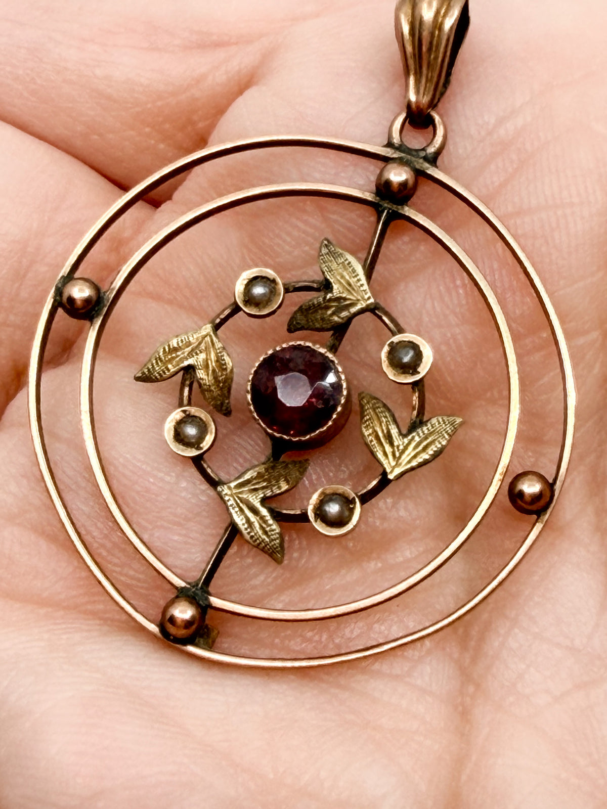 Edwardian 9k gold lavalier pendant with garnet and seed pearls
