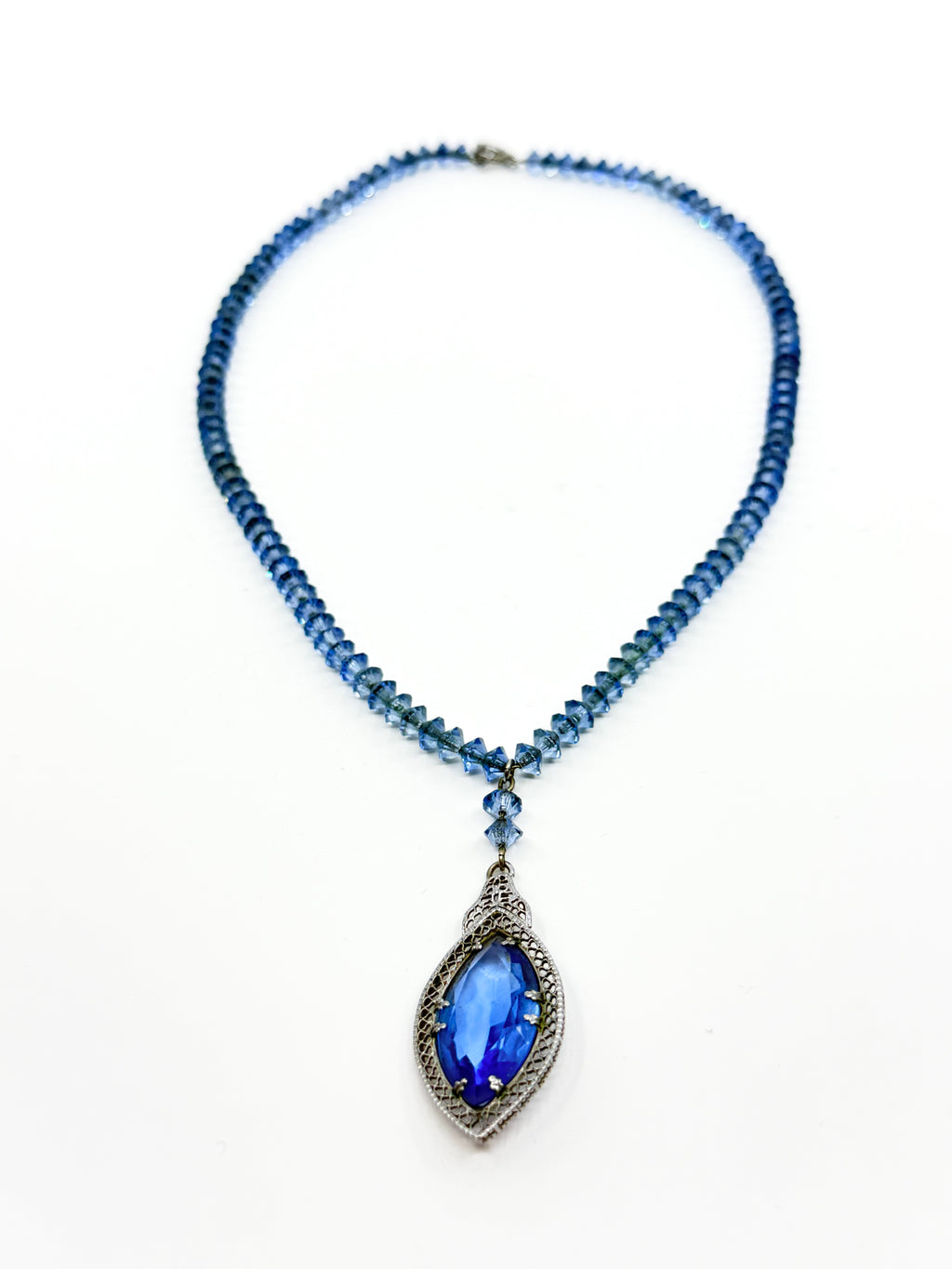 Art Deco blue glass pendant necklace strung on chain