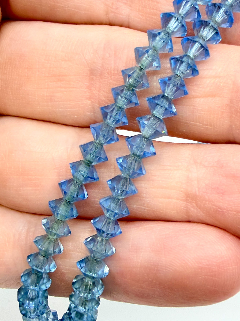 Art Deco blue glass pendant necklace strung on chain