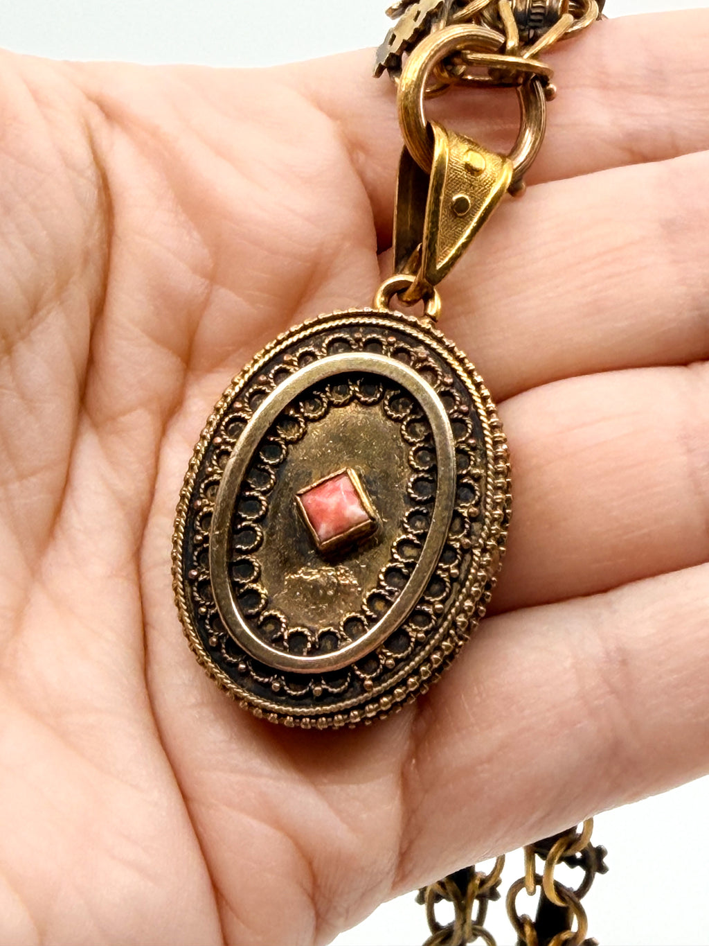 Close up of a Victorian locket with coral