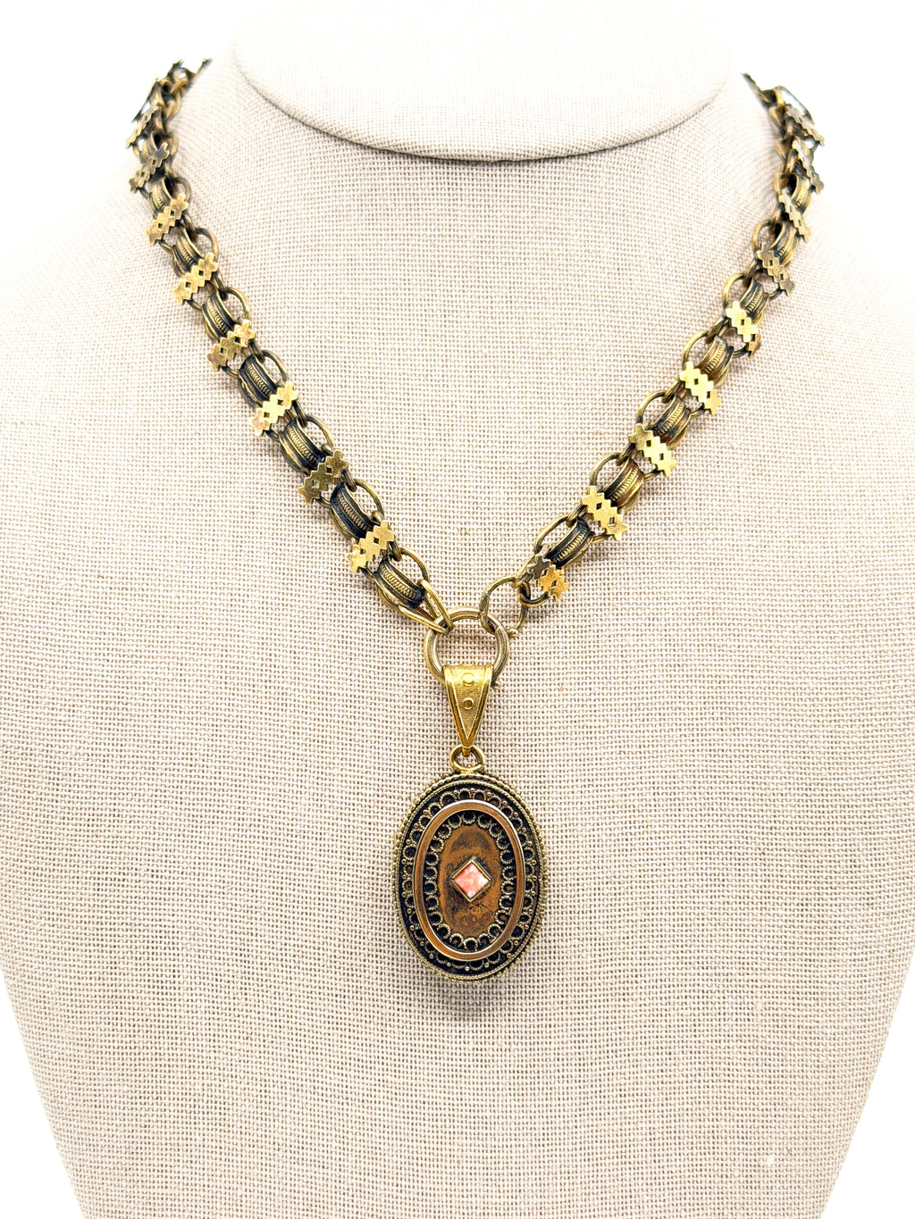 Victorian book chain and locket necklace on bust 