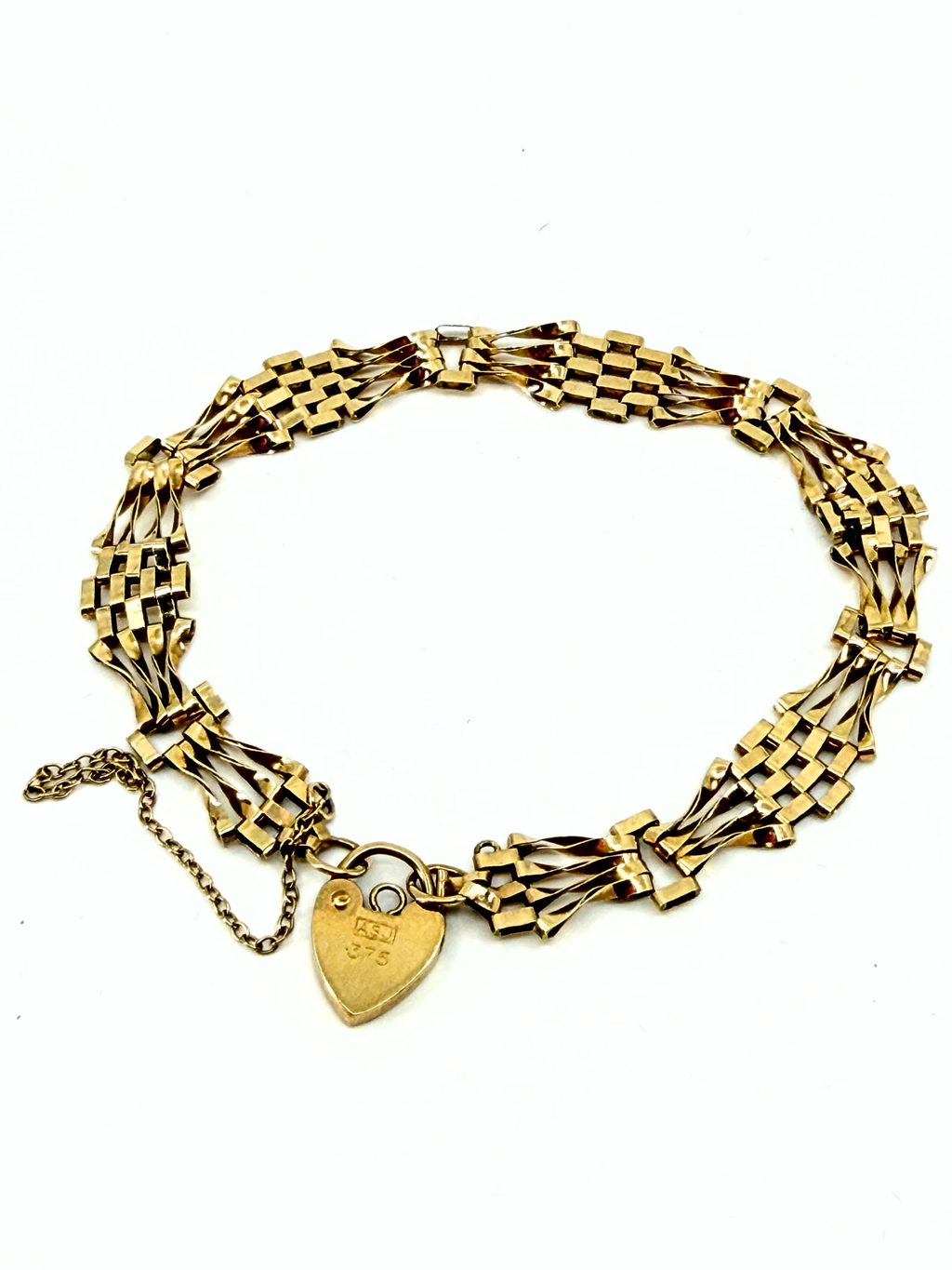 Vintage 9k gold gate bracelet with heart padlock charm