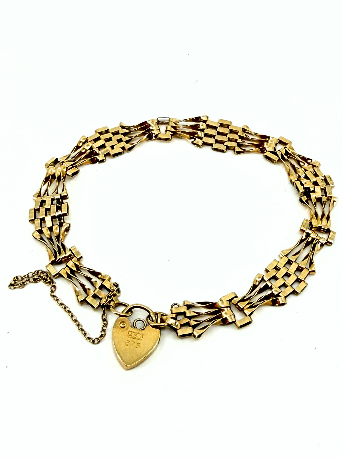 Vintage 9k gold gate bracelet with heart padlock charm