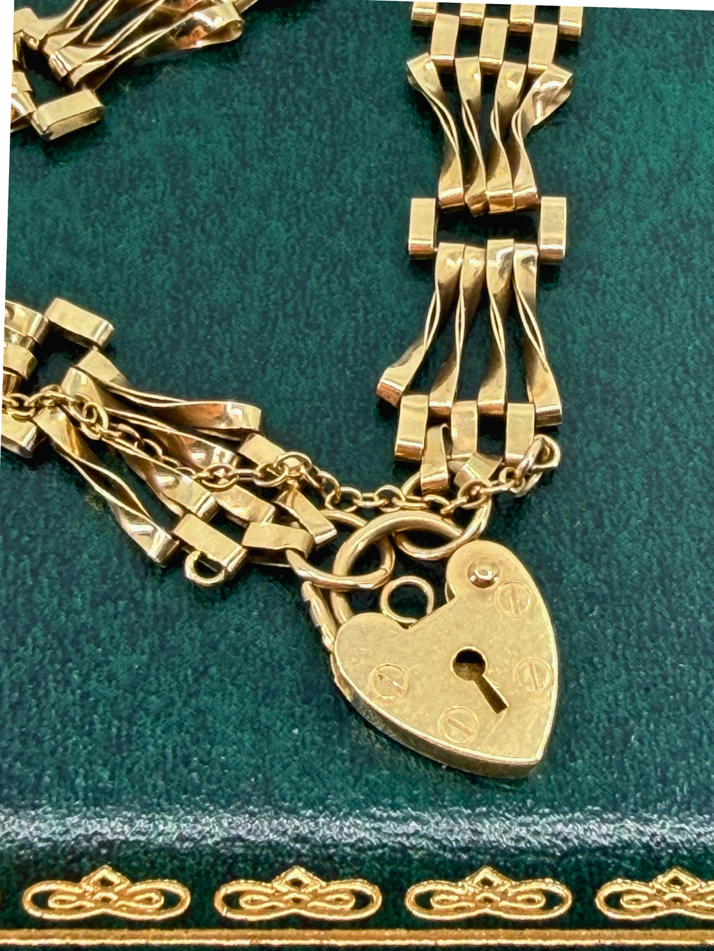 Vintage 9k gold gate bracelet with heart padlock charm