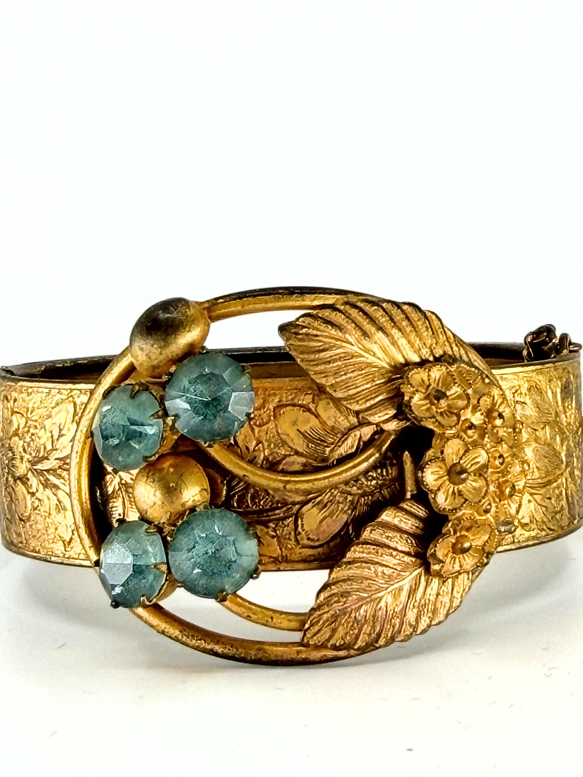 1930s stamped brass wide cuff bracelet with blue rhinestones