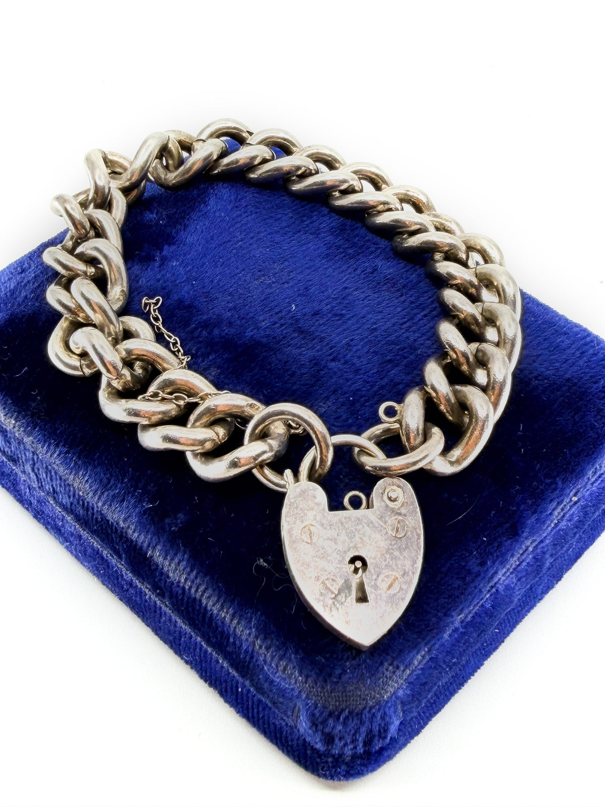 Heavy vintage sterling silver curb bracelet with padlock heart clasp