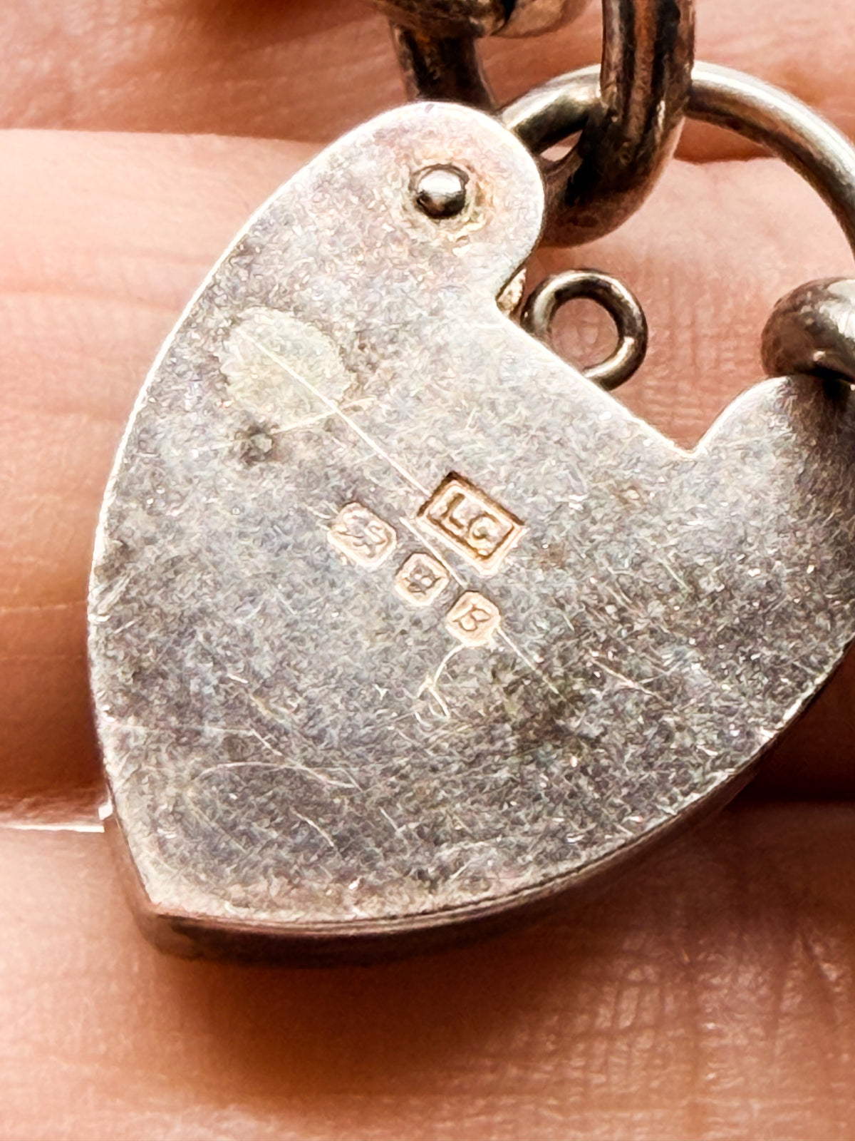 Heavy vintage sterling silver curb bracelet with padlock heart clasp