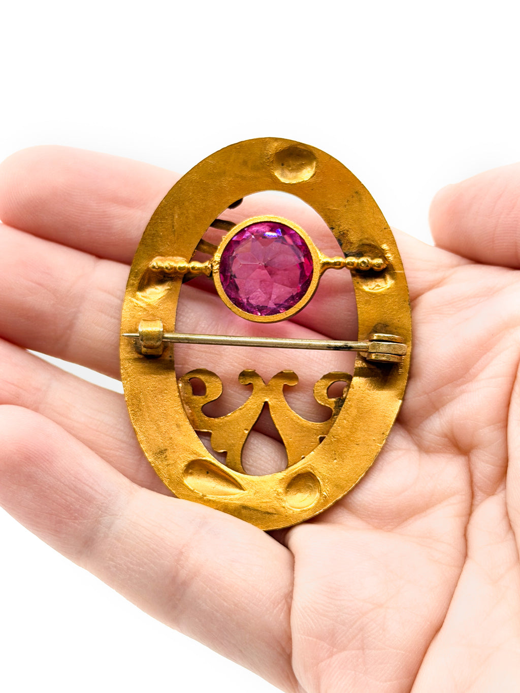 Art nouveau snake sash brooch with pink glass stone